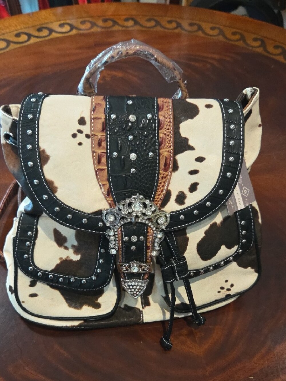 Cowhide-Pattern Studded Backpack with Western Buckle - Brown & Cream